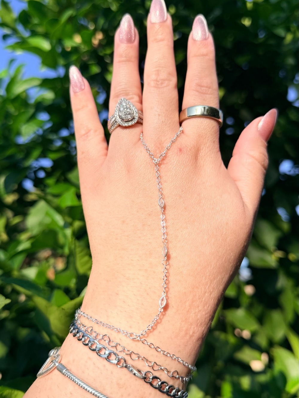 925 Sterling Silver Hand Chain Bracelet with oval shape rhinestones.
